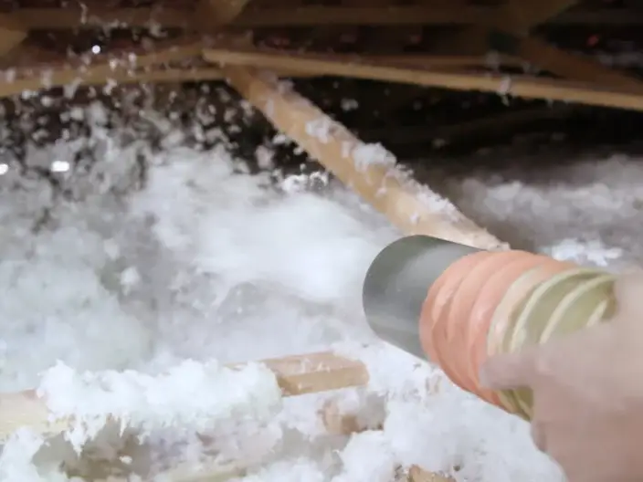 Soufflage de flocons de laine